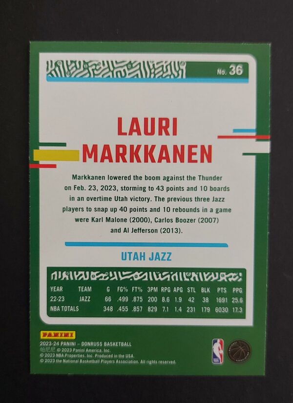 2023-24 Panini Donruss Lauri Markkanen #36 64/99 Purple Laser